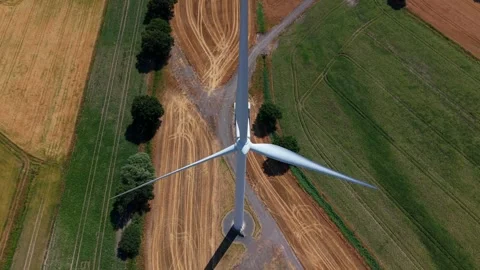 Close-Up Aerial View of Large Onshore Wind Farm and Renewable Power Turbines Stock Footage 341475601