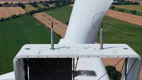 Close-Up Aerial View of Large Onshore Wind Farm and Renewable Power Turbines Stock Footage 341475657