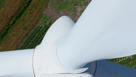 Close-Up Aerial View of Large Onshore Wind Farm and Renewable Power Turbines Stock Footage 341475907