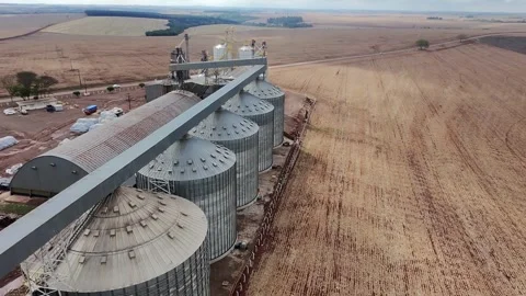 Close Aerial View of Massive Grain Silos and Impressive Structural Design Stock Footage 320199054