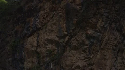 Close aerial view of mountains with trees at Noori waterfall, Pakistan Stock Footage 172312209