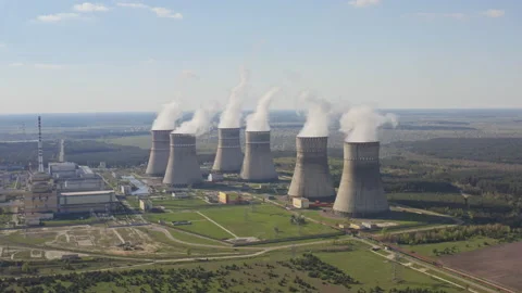 Close up aerial view to nuclear power plant. Atomic power stations sources of Stock Footage 182023629
