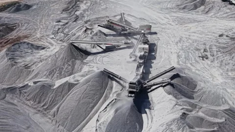 Close up aerial view of stone crushing system and conveyors Stock Footage 338221699