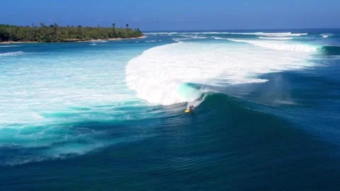 Close Up Aerial View Of Surfer Performing Turn On Big Blue Ocean Wave Top Stock Footage 333223094