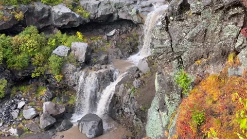 Close-up aerial view of a two-stage waterfall. Stunning autumn landscape Stock Footage 140576897