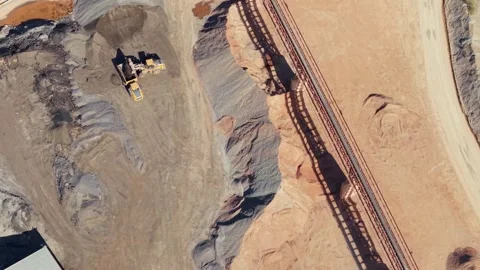 Close Up Aerial View of Wheel Loader Scoop Bucket Shoveling Aggregates in Stock Footage 342854976