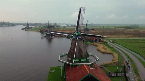 Close Up Aerial of Windmill Blades and Zaanse Schans Landscape Stock Footage 331228137