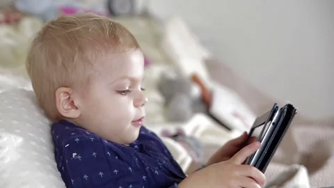 Close up af adorable blond boy with tablet.FULL HD Stock Footage 73959871
