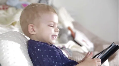 Close up af adorable blond boy with tablet.FULL HD.slow motion Stock Footage 73961288