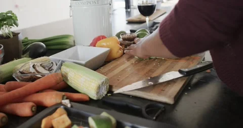 Close up of african american plus size woman cleaning waste in kitchen, slow Stock Footage 340008940