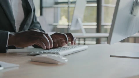 Close up african american specialist programmer businessman working computer in Stock Footage 209347669