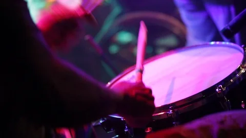Close up of African drummer playing drum kit live on stage during a concert Stock Footage