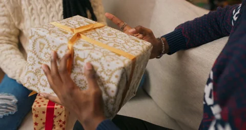 Close-up of African-looking students preparing for Christmas and packing 動画素材 211596358