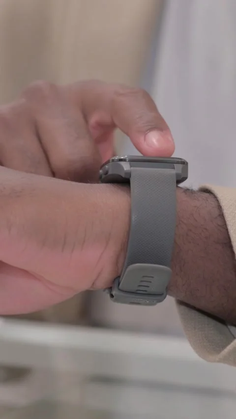 Close up of African Male Hand Using Smartwatch, vertical video Video stock 328565998