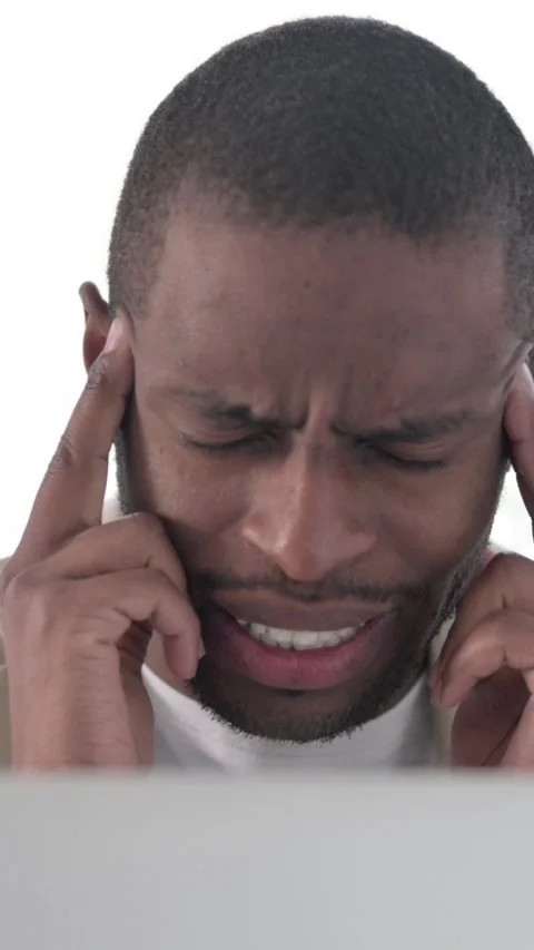Close up of African Man having Headache while using Laptop, Vertical Video Stock Footage 337350158