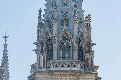 Close-up of an aged Gothic cathedral, emphasizing its height and intricate .. Stock Photos