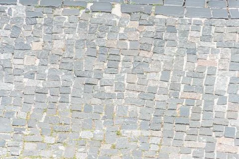 Close-up of aged, rectangular stone pattern wallfloor, old European city, amb Stock Photos