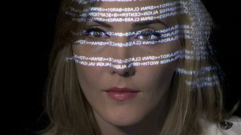 Close up of an ai artificial intelligence IT female programming binary code o Stock Footage 86435520