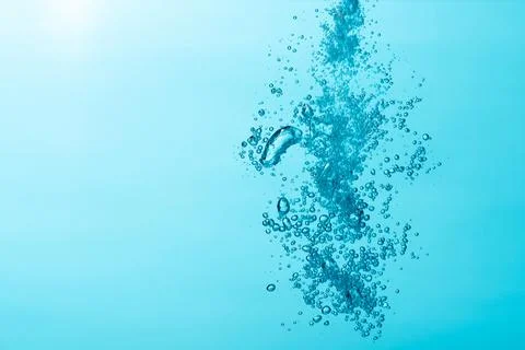 Close up of  air bubble , isolated on blue background. Stock Photos