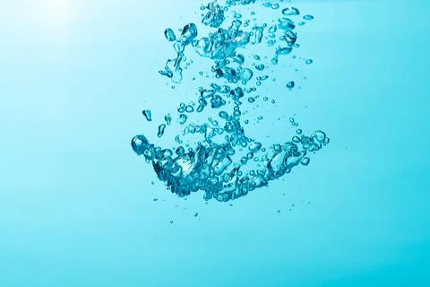 Close up of  air bubble , isolated on blue background. Stock Photos