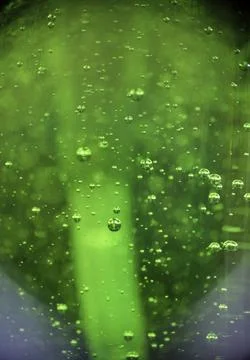 Close-up of air bubbles in soap bottle. Stock Photos