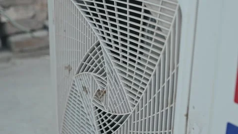 Close Up of Air Conditioner Outdoor Unit Fan Grill Cooling System Stock Footage 337189775