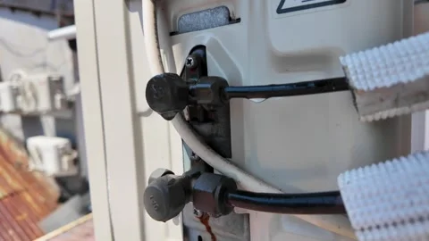 Close-up of Air Conditioner Outdoor Unit Compressor Valves and Refrigerant Pipes Stock Footage 345102617