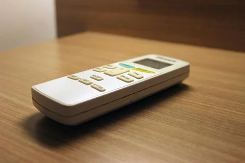 Close up of the air conditioner remote on the table Stock Photos