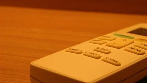 Close up of the air conditioner remote on the table Foto stock