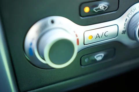 Close up of air conditioning control panel in modern car. Selective focus. Stock Photos