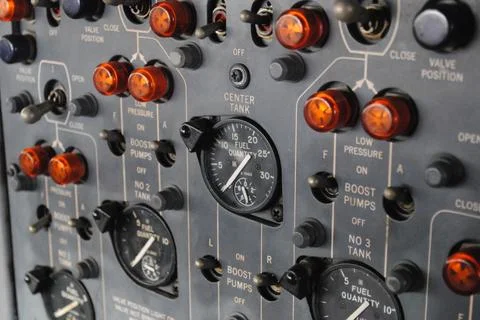 Close-up of Aircraft Control Panel with Gauges and Switches Stock Photos