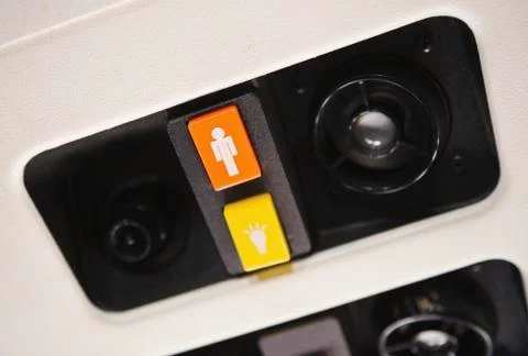 Close up of airplane call button Stock Photos