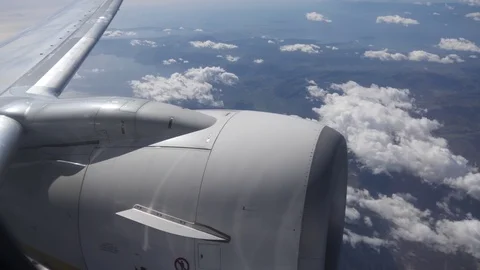 Close up of airplane turbine flying Stock Footage