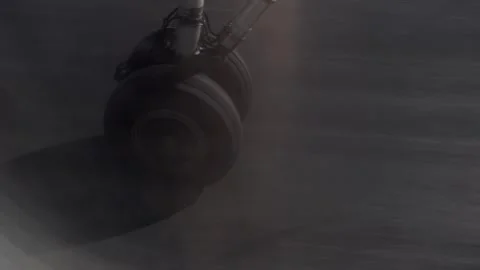 Close-up on airplane wheels landing Видео 283301569