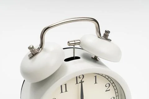 Close up. alarm clock on a white background. concept of early morning ascents Stock Photos