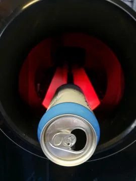 Close up of alcoholic drink can in automatic reverse vending machine Stock Photos