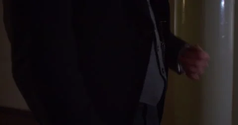 Close up of Alexander Pushkin taking out his pocket watch and looking, 4k Stock Footage 138001443