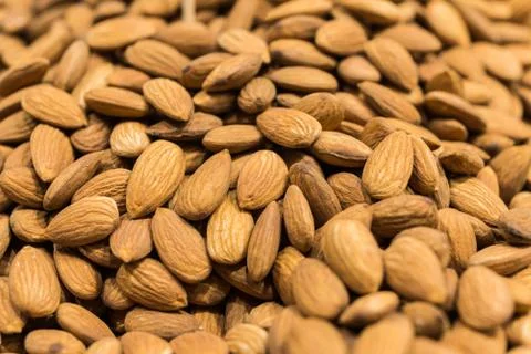 Close up of almonds nuts on a display. Stock Photos