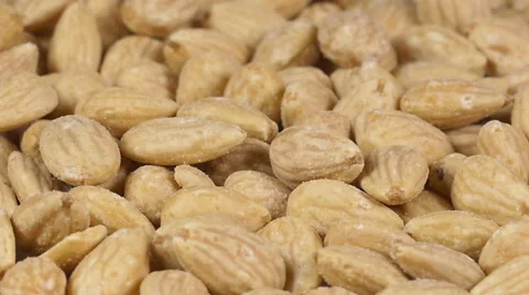 Close-up of almonds on a rotating plate Stock Footage 60191033