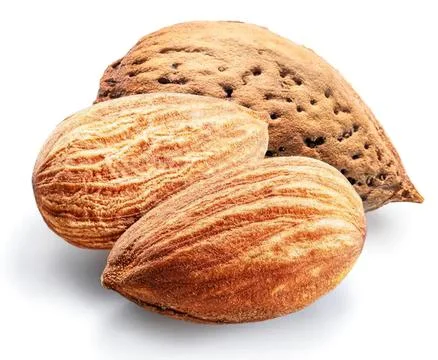 Close-up of almonds with shells on a white background Stock Photos