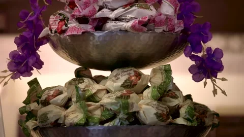 Close up Amaretti on Three-tier macaroon holder. Pastry shop. Tilt 4K Vidéo 331450517