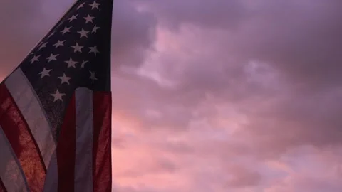 Close up of the American flag at dusk Stock Footage 312510658