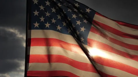 Close up American flag waving in the wind against sunset with slow motion Stock Footage 311800079