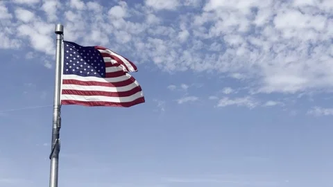 Close‑Up American Flag Waving in the Wind Stock-Footage 332382567
