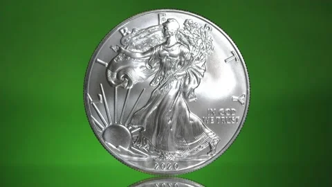Close up American Silver Eagle Coin on green screen Stock-Footage 133043003