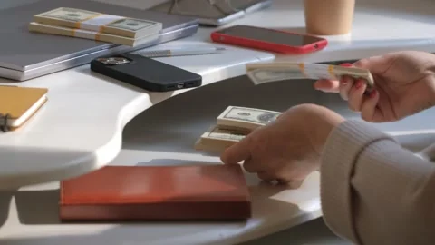 Close-up of American US dollars in hands, counting money. Business person Stock Footage 252840219