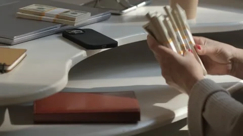 Close-up of American US dollars in hands, counting money. Business person Stock Footage 253184889