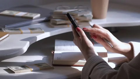 Close-up of American US dollars in hands, counting money. Business person Stock Footage 253618094