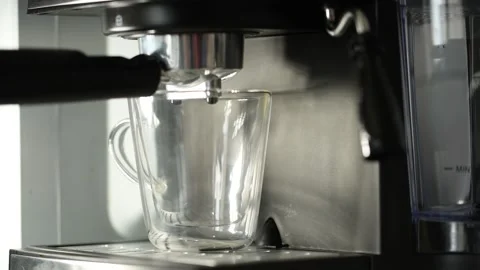 Close up of americano pouring from coffee machine. Stock Footage 142280734