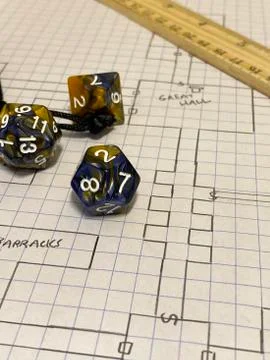 Close up of aming dice on a map Foto stock